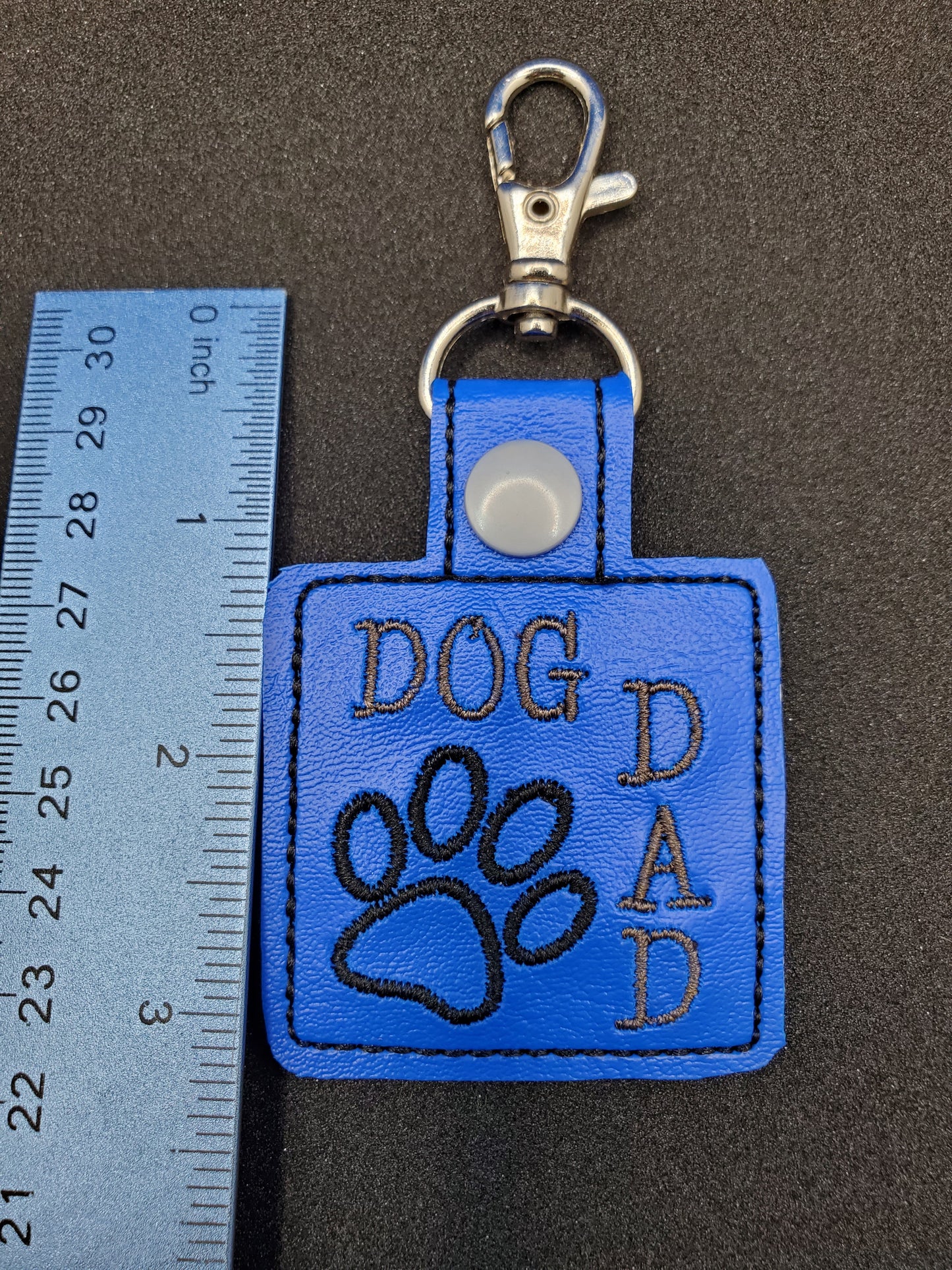 Dog Dad - Words stitched in gray, Key Chain / Backpack Charm