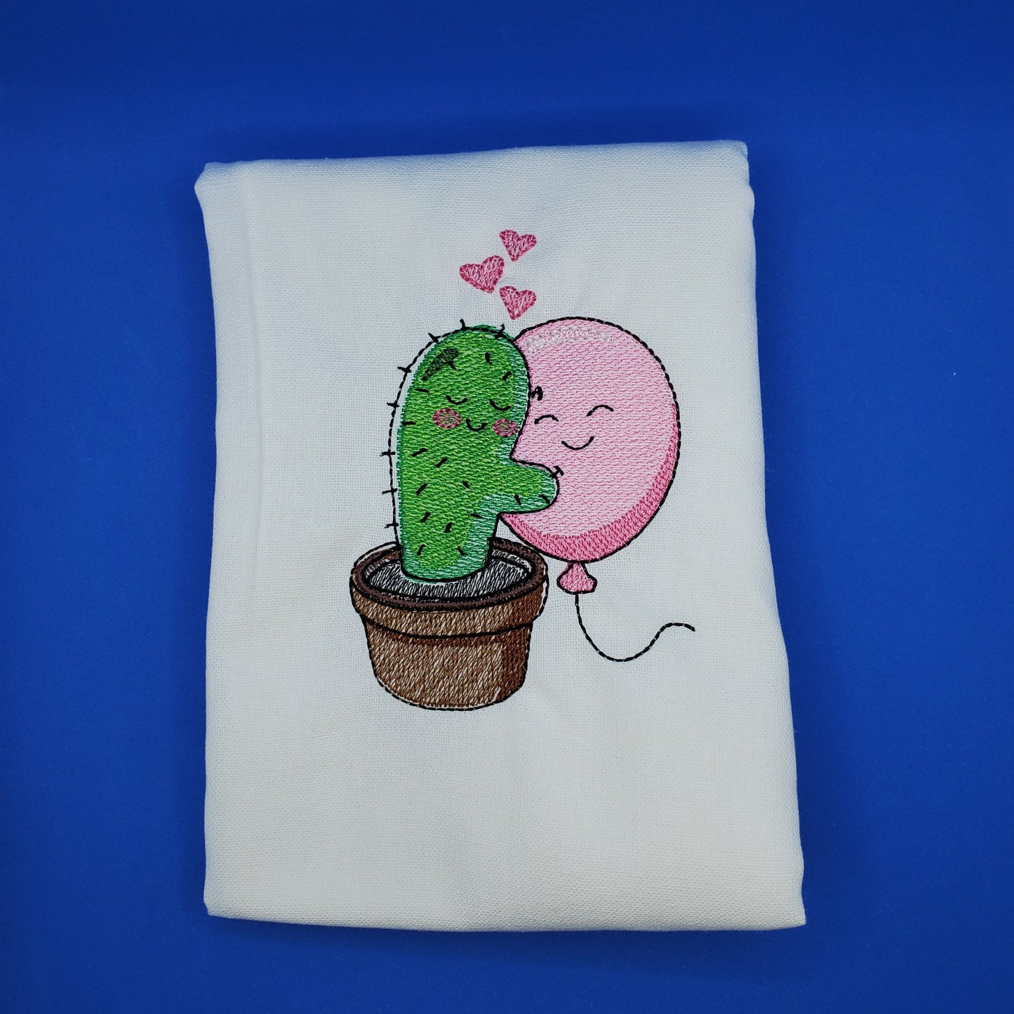 Cactus and Balloon Hug on flat weave 100% cotton towel
